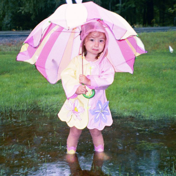Little Girl in Wet Yard Little Girl in Wet Yard